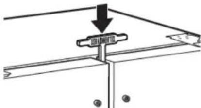 Technical diagram showing a mechanical assembly with a labeled component and directional arrow indicating motion or force.