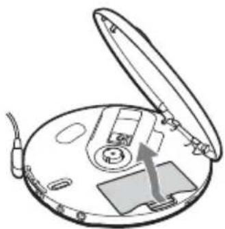SONY DNE715 - Öppna batterifackets lucka på insidan av CD-spelaren. - 1