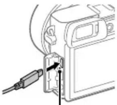 SONY ILCE6100L - Connect the camera with the battery pack inserted to the AC Adaptor (supplied) using the micro USB cable (supplied), and connect the AC Adaptor to the wall outlet (wall socket). - 1