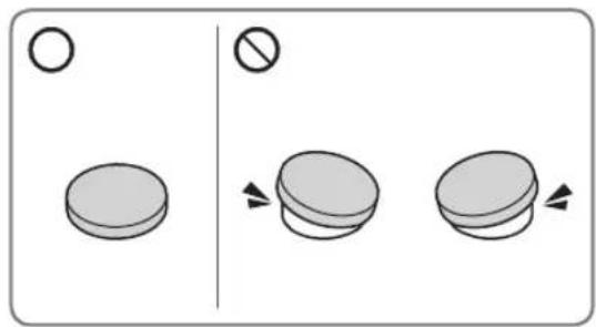 Diagram showing three states of a battery with symbols: one open circle, another with a prohibition sign, and a third with arrows indicating movement.