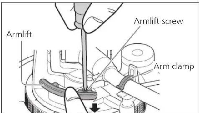 TECHNICS SL1200MK7 - Return the tone arm to the arm rest, clamp it with the arm clamp and while pressing the armlift down with your finger, turn the screw to adjust the height. - 1