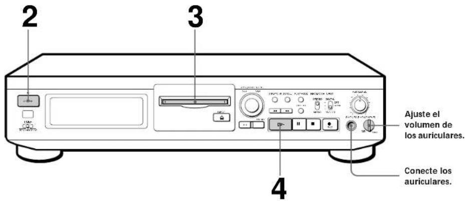 Ajuste el volumen de los auriculares. Conecte los auriculares.
