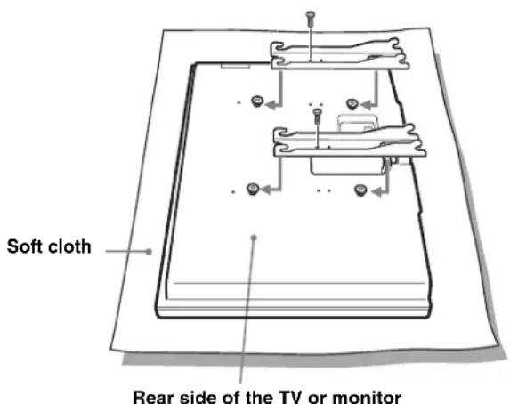SONY SUWL51 - Attach the Mounting Hook Units on the hooks on the rear side of the TV or monitor. Then slide the Mounting Hook Units, as illustrated below, and secure them using the supplied screws (+PSW5× L16) - 1