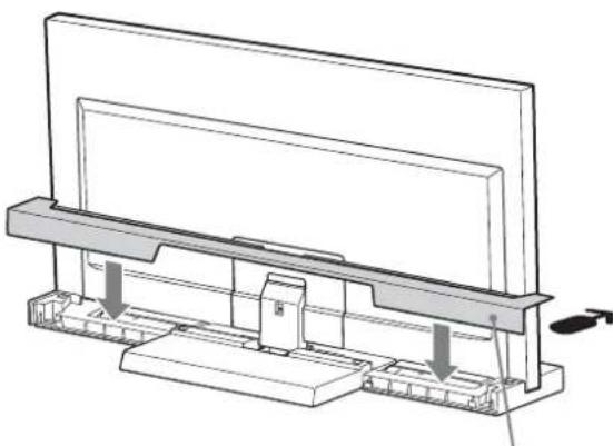 SONY SU40NX1 - Bringen Sie die wichtere Abdeckung am Fernsehsteller an. - 1