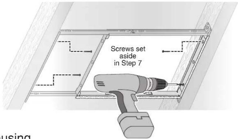 Screws set aside in Step 7 using