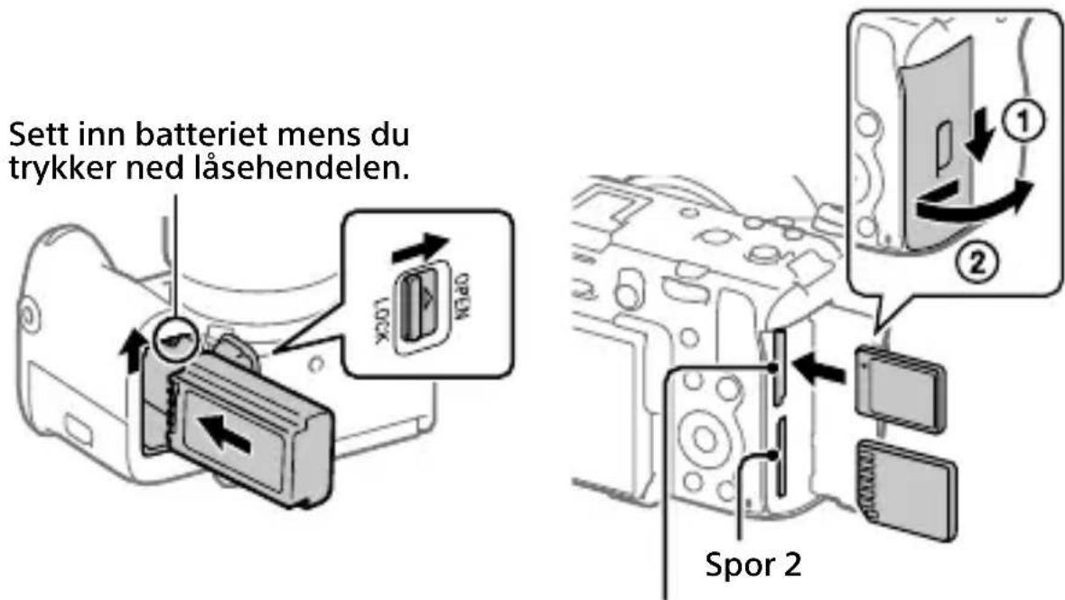 Sett inn batteriet mens du trykker ned läsehendelen. Spor 2