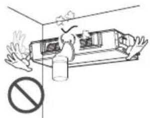Safety warning illustration showing a person inside a vehicle with a 'No' symbol indicating no hazard.