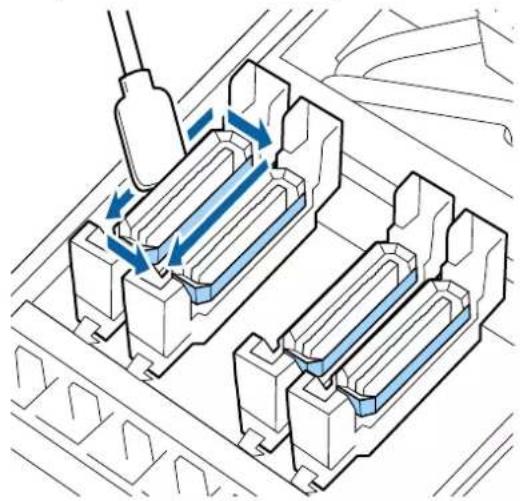 EPSON SureColor SCS60600L - Tenez la tige de nettoyage perpendicular et essuyez la zone externe des capuchons. - 1