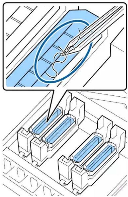 EPSON SureColor SCS60600L - En présence de poussière ou de fibres dans le capuchon - 1