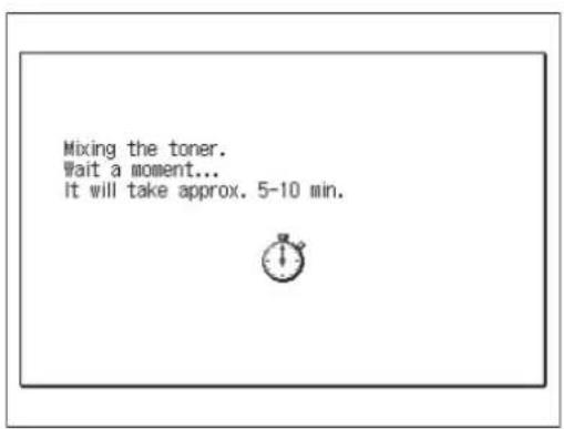 Mixing the toner. Wait a moment... It will take approx. 5-10 min.