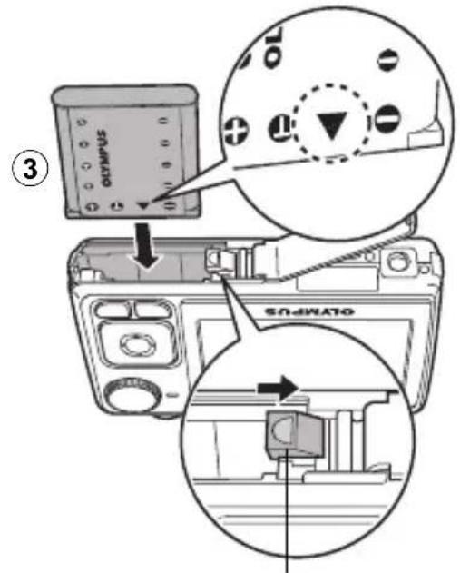 OLYMPUS X790 - b. Insert the battery in the camera. - 3