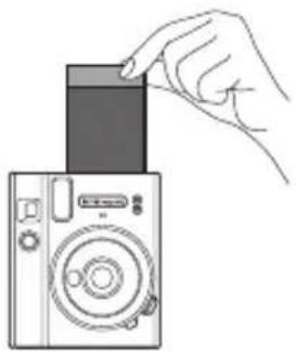 FUJIFILM Instax Mini 40 - When the sound of the film being ejected stops, grasp the edge of the ejected film and take the film out. - 1