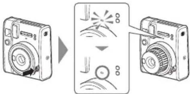 FUJIFILM Instax Mini 40 - Once the batteries are loaded, press the power button to turn the camera on. - 1