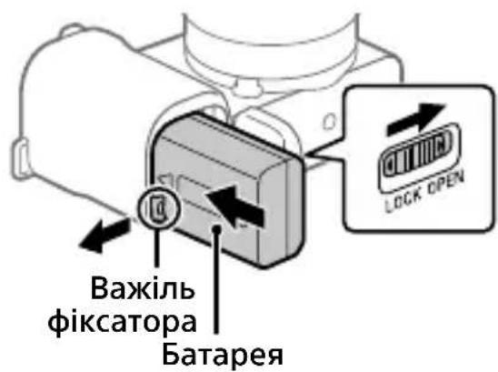 SONY ZVE10L - Вставляння батареї (додається)/карти пам'яті (продається окремо) у фотоапарат - 1