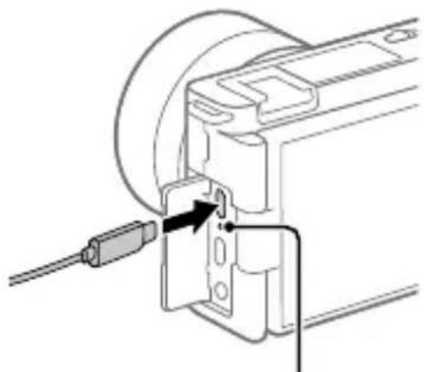 SONY ZVE10L - Connect the camera with the battery pack inserted to the AC Adaptor (supplied) using the USB cable (supplied), and connect the AC Adaptor to the wall outlet (wall socket). - 1