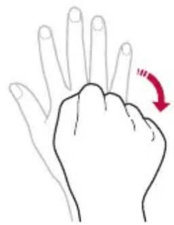 LG K580 - Gesture shot - 2