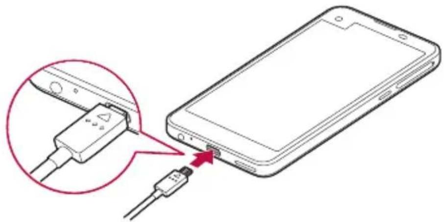 LG K500N - Chargement de la batterie - 1