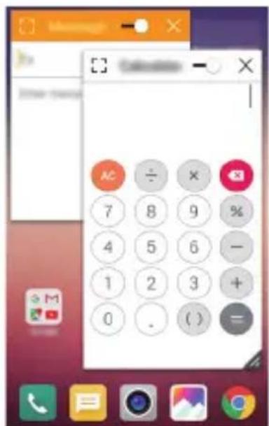 Screenshot of a mobile phone interface showing a calculator with numeric keypad and status bar in Chinese