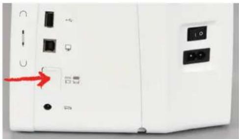 BERNINA 570 QE E - Escamoter la griffe d'entrainment - 1