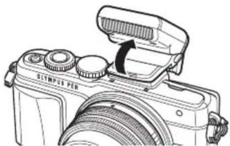 OLYMPUS PTEP13 - Fije el flash a la cámara y eleve la pieza que emite luz - 1