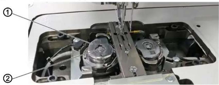 Dürkopp Adler 755 A - Changer les canettes - 1