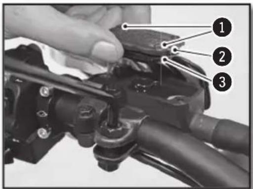 Close-up mechanical assembly diagram with numbered annotations pointing to components