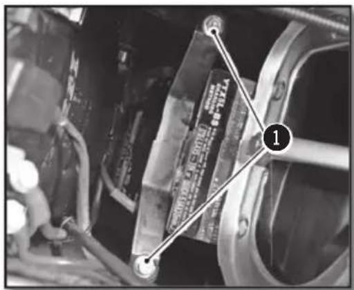 Close-up mechanical assembly photo with numbered annotation pointing to a component labeled '1'
