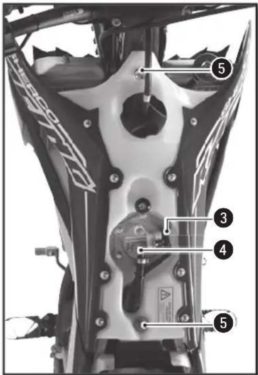 Labeled mechanical component diagram showing five numbered parts with annotations and safety symbols