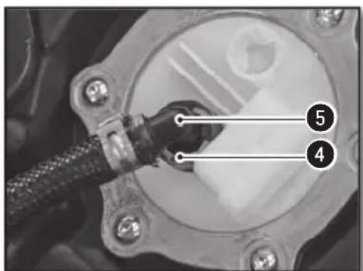 Close-up of a mechanical component with numbered annotations pointing to parts 4 and 5