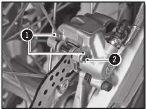 Technical diagram of a mechanical assembly with numbered annotations pointing to components