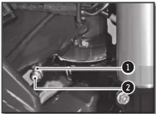 Technical diagram showing mechanical components with numbered annotations pointing to specific parts.