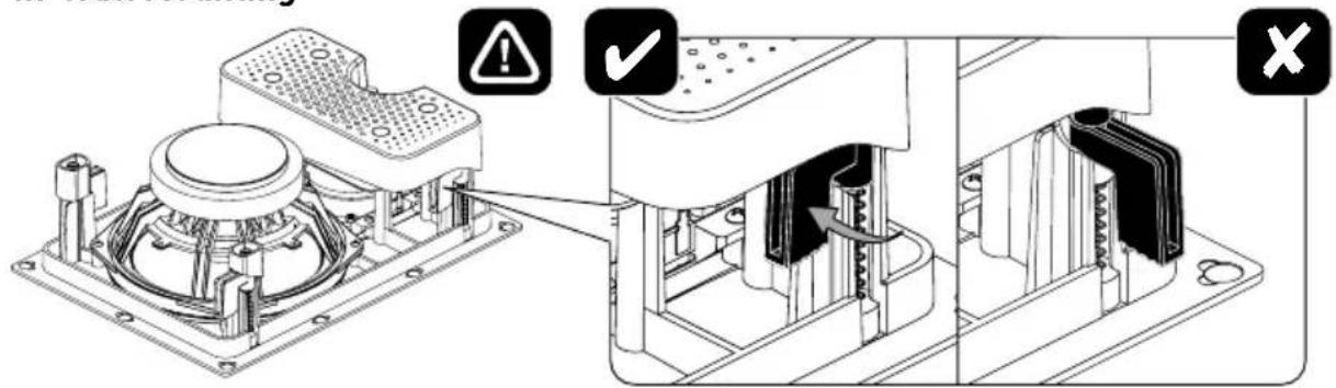 Technical diagram showing assembly of an electronic device with warning symbols and labeled ports