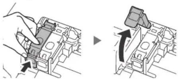 CANON Pixma TS6540i - Pincez et ouvre le couvercle de verrouillage de cartouche d'encre sur la gauche. - 1