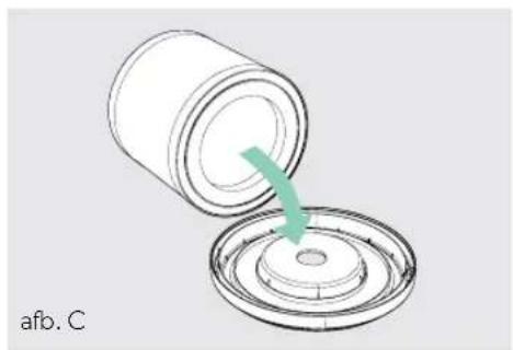 Diagram showing a cylindrical container being inserted into a circular component with a green arrow indicating the process (no text or symbols)