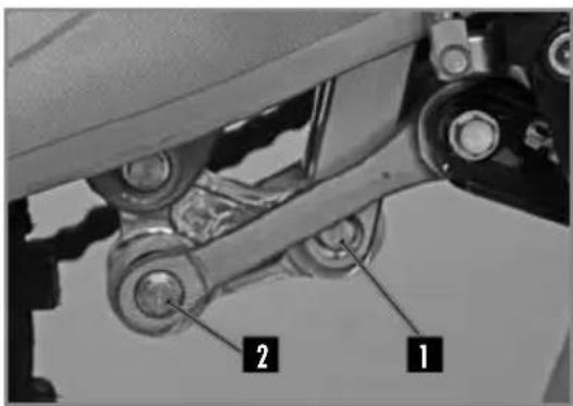 Technical diagram of a mechanical assembly with labeled parts 1 and 2