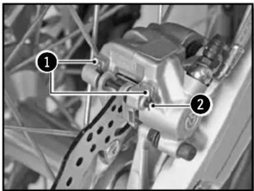 Close-up of a mechanical component with numbered annotations pointing to parts of the main body.