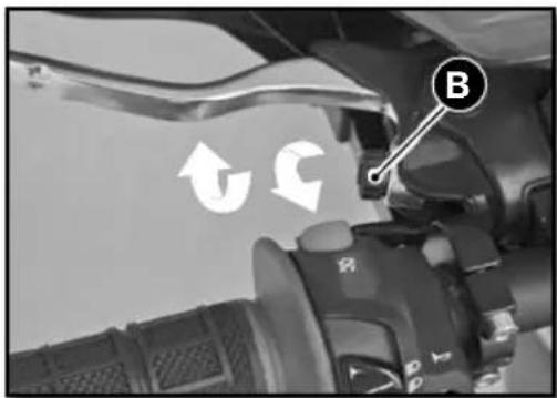 Close-up of a car's license plate with directional arrows and a labeled 'B' tag, likely indicating parking or movement.
