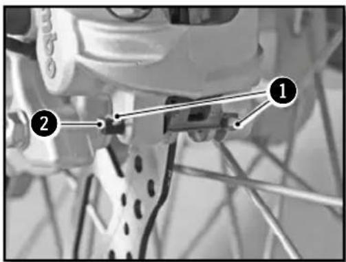 Diagram of bicycle wheel components with numbered labels pointing to specific parts