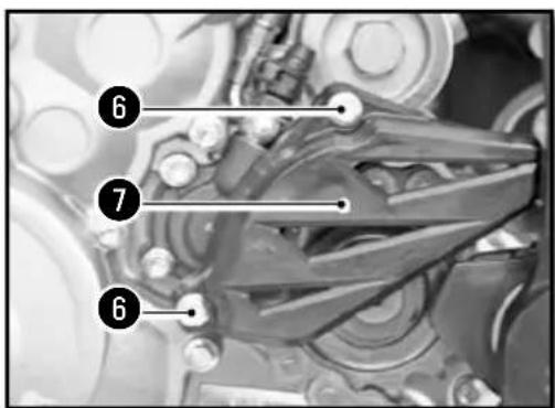 Mechanical diagram showing labeled components with numbered annotations (6, 7)