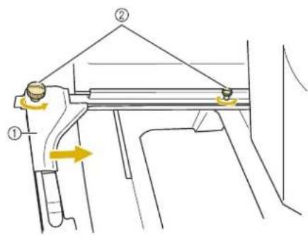 BABY LOCK Venture - Desserrez les deux vis de serrage à main de gauche, sur le support du cadre de broderie. - 1