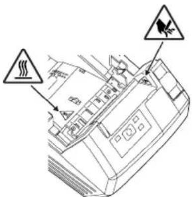 Technical diagram of a vehicle's front panel with warning symbols and warning labels in Chinese