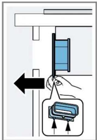 Diagram showing a hand holding a blue panel next to a device with directional arrows, likely illustrating a process or installation.