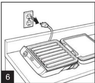 Line drawing of a refrigerator with an electrical outlet connected to a tray (no text or symbols)