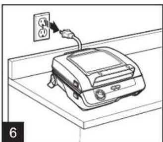 Line drawing of a portable appliance with an outlet cable, no text or symbols present