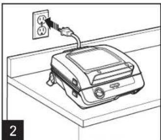 Line drawing of a portable electronic device mounted on a shelf with an outlet cable (no text or symbols)