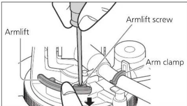 TECHNICS SL100C - Return the tone arm to the arm rest, clamp it with the arm clamp and while pressing the armlift down with your finger, turn the screw to adjust the height. - 1