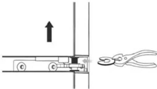 Diagram showing a mechanical assembly with an upward arrow and a pliers, illustrating a process or operation.