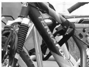 Pro-User Amber III - Now secure the bikes using the long safety belt. - 1