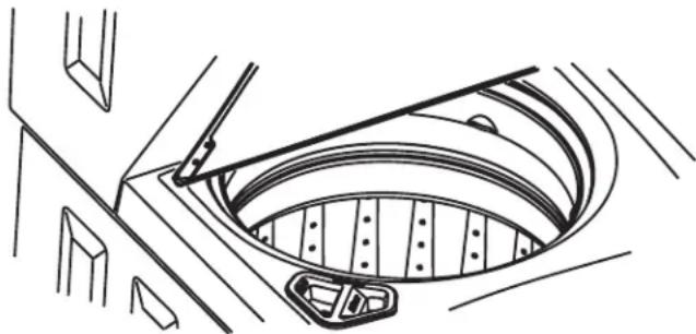 FRIGIDAIRE FFLG2022MW - Placer la brassée dans la laveuse - 1