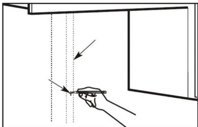 Diagram showing hand holding a pen with arrows indicating direction of movement or force, possibly illustrating a physical or mechanical concept.
